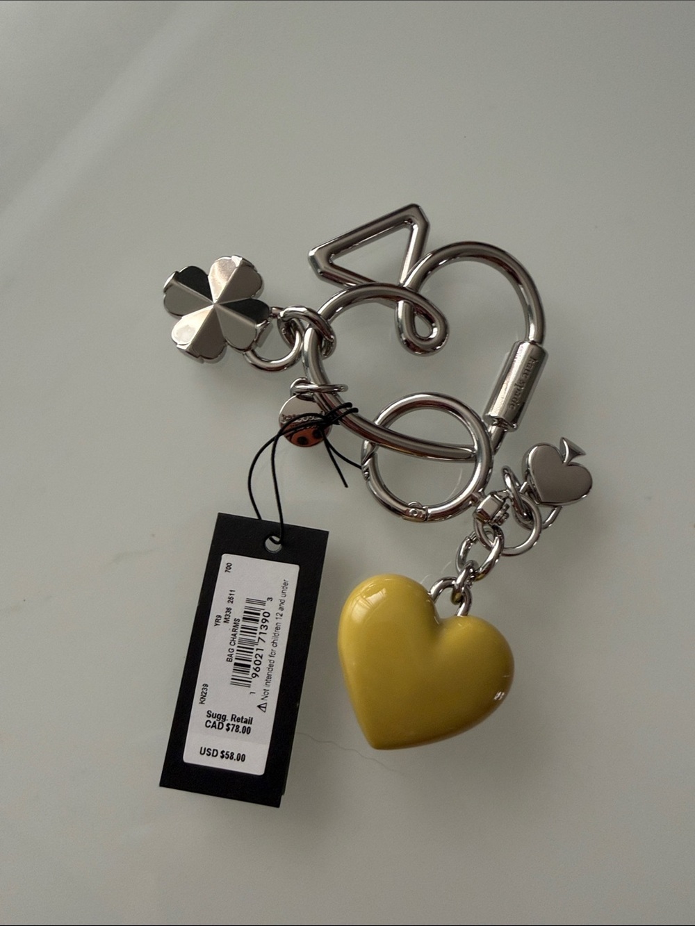 kate spade Silver Tone Keychain with Yellow Heart Charm